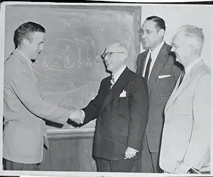 Terry Brennan Shaking Hands with Arch Ward
