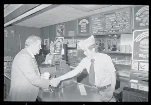 Rochester Prints: Terry Sanford Shaking Hands with Restaurant Employee