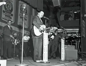 Nashville Prints: Tex Ritter Playing Guitar and Singing at Grand Ole Opry