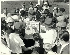 Headline Prints: Textile Workers Look at Newspaper