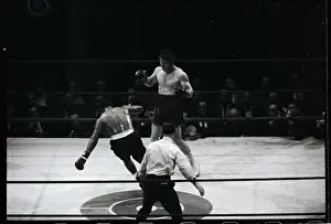 Thad Spencer Going Down in Boxing Match