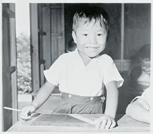 Thai Boy at School Desk