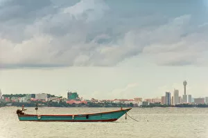 Thai traditional fishing boat and Pattaya city