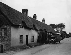 Prints of circa 1930: A row of thatched cottages in the village of Lulworth in Dorset. (Photo by Fox Photos/Getty Images) Timeless Treasures: Iconic Black and White Prints from the Fox Photo Library: Thatched Cottage