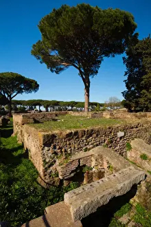 Ruined City Prints: TheA viewpoint over the ruins of the Ancient Roman harbour city of Ostia Antica in Rome