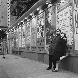 Theater Posters and Pedestrians on Broadway