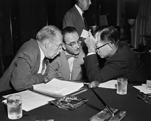 Theodore Green Conferring with Colleagues