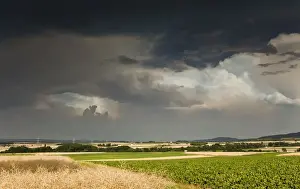 Thunder Prints: Thick storm clouds gathering over a farming area, Bavaria, Germany, Europe