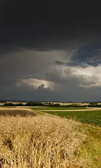 Thunder Prints: Thick storm clouds gathering over a farming area, Bavaria, Germany, Europe