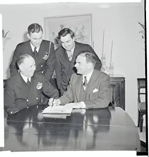 Thomas E Prints: Thomas Dewey Signing an Agreement