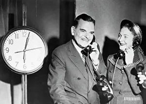 Thomas Dewey and Wife Talking on Telephones
