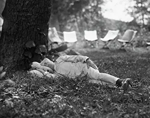 Prints of (Original Caption) 7/1921- Blue Ridge Mountains- President Harding goes camping in the Blue Ridge Mountains. It is said that Thomas Edison sleeps only four hours a night A Visual Journey Through Innovation: Thomas Edison Taking Nap Under a Tree