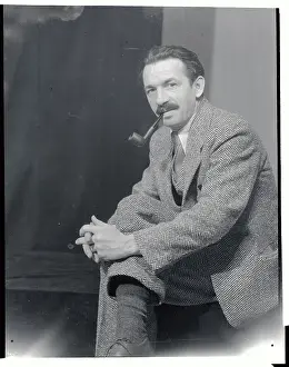 Thomas Hart Benton Sitting with his Pipe