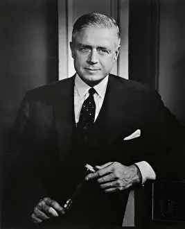 Thomas J Prints: Thomas J. Watson Holding Object in Hands