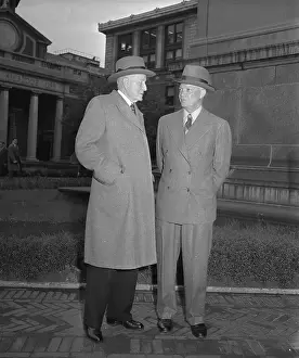 Prints of (Original Caption). Thomas J. Watson Sr. is seen here with Dwight D. Eisenhower at Columbia University Eisenhower Unveiled: A Visual Journey Through History: Thomas J. Watson Sr. and Dwight Eisenhower Standing on Street