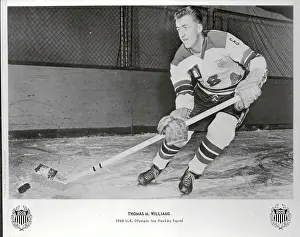 Thomas M. Williams Holding his Hockey Stick