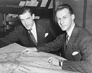 Thor Heyerdahl and Herman Watzuiger Studying Map