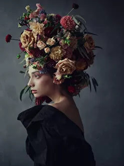 thoughtful young woman floral headdress