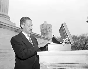 Thurgood Marshall Gathering His Papers