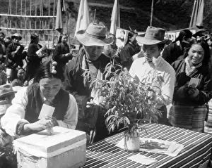 Tibetan Citizens Casting Their Ballots in Box