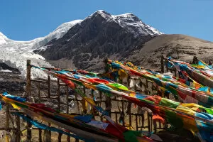 Images Dated 3rd June 2016: Tibetan Prayer Flag and big snowy mountain in background