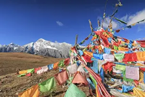 Town Square Prints: Tibetan Prayer Flags on foreground and Jade Dragon Snow Mountain on background