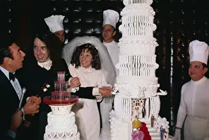 Tiny Tim and Bride at Wedding Cake