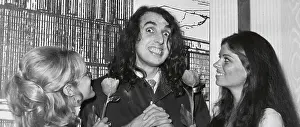 Tiny Tim with Microphone and near Audience