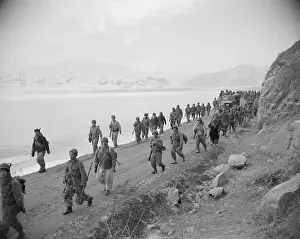 Tired Troops Walk Road Towards Rest Stop