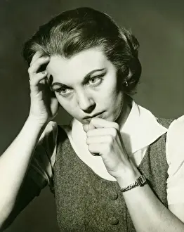 Worried Prints: Tired woman posing in studio, (B&W), portrait