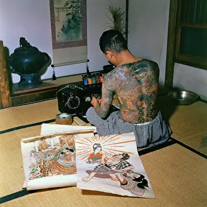 Tokumitsu Uchida Displaying His Own Tattoos