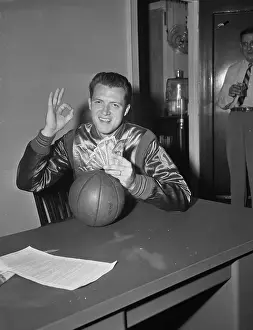 Tom Gola Flashing the Okay Sign