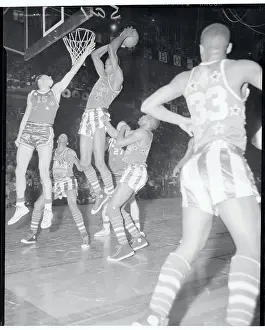 Tom Gola Trying to Block a Shot