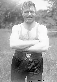 Prints of CIRCA 1900: Heavyweight boxer Tom Heeney poses for a portrait, circa 1900. (Photo by The Stanley Weston Archive/Getty Images) In the Ring: The Art of Boxing: Tom Heeney