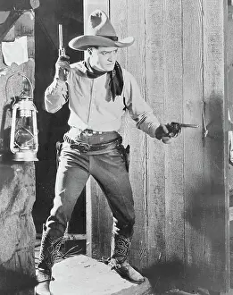 Revolver Prints: Tom Mix at the Ready