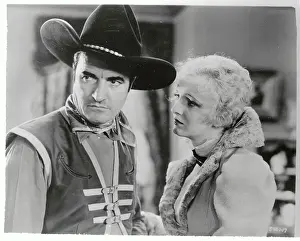 Tom Mix with Young Woman in Western Film