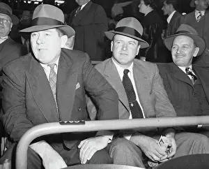 Tom Yawkey and Joe Cronin Watching Ball Game