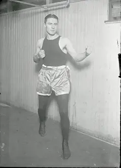 Intimidation Prints: Tommy Loughran Posing in Boxer's Stance