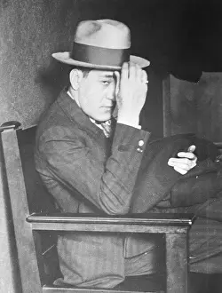 Hands Prints: Tony Accardo Seated in Chair with Hand on Hat