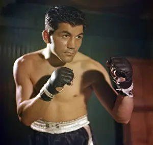 Prints of NEW YORK, NY - CIRCA 1950: Welterweight professional boxer Tony DeMarco of the United States poses for a portrait circa 1950 at Stillman's Gym in New York, New York In the Ring: The Art of Boxing: Tony DeMarco
