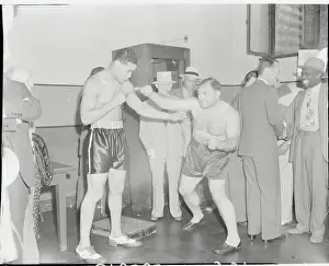 Tony Galento and Joe Louis Squaring Off