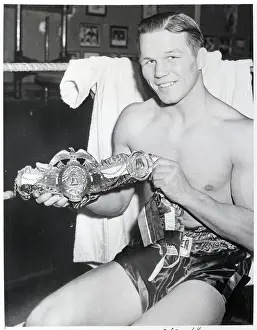 Tony Zale Holding Championship Belt