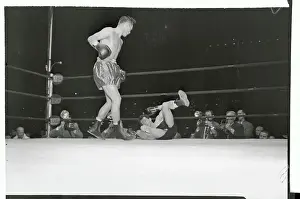Tony Zale Towering over Rocky Graziano in Boxing Ring