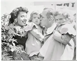 Fatherhood Prints: Tony Zale with Wife and Kissing Daughter