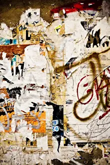 Fill Prints: Torn bills on a billboard