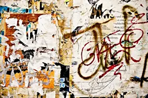 Fill Prints: Torn bills on a billboard