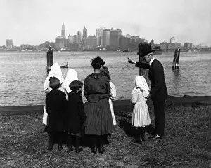 Tour Prints: Tour guide showing children (8-9) around city