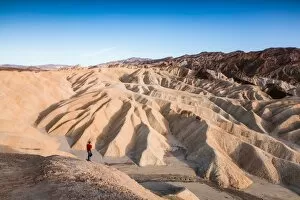 Death Valley National Park Collection: Tourist at Zabriskie point, Death valley, USA