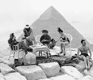 Sunbathing Prints: Tourists on Top of Great Pyramid