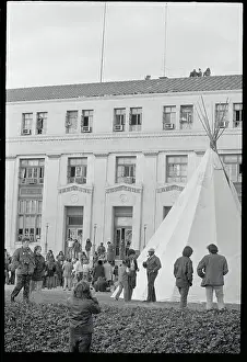 Tourists and Indians Conversing